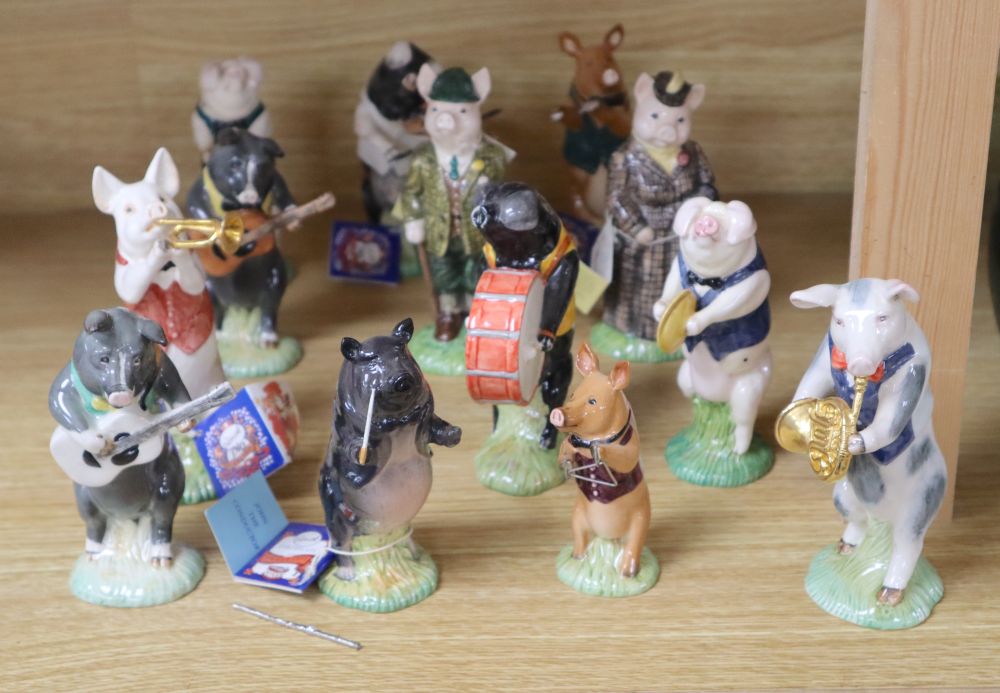 The Beswick Pig Promenade orchestra - eleven instrumentalists and two Beswick English Folk pigs